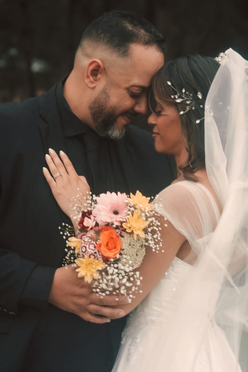 Wedding couple with bouquet